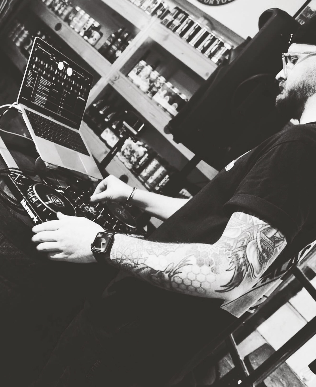 DJ Findy performing behind the decks
